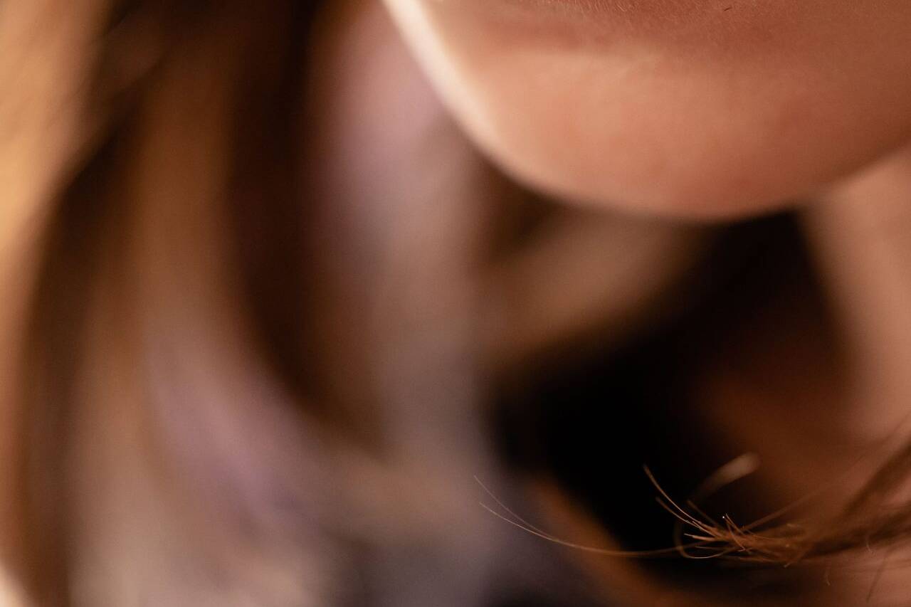 Image of close-up image of a woman's lips - this detailed photo focuses on a woman's lips with delicate lighting highlighting their natural texture and softness. perfect for beauty content, skincare, and makeup discussions, emphasizing lip care and feminine features.