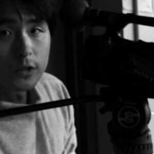 Hotaka Matsumura operating a camera