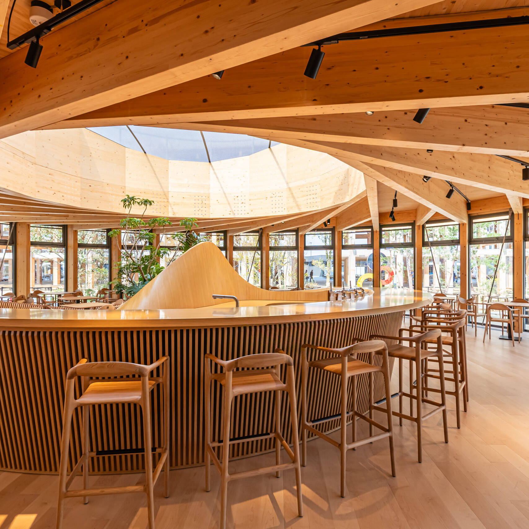 Timber caf&eacute; interior at an Expo 2025 Osaka pavilion